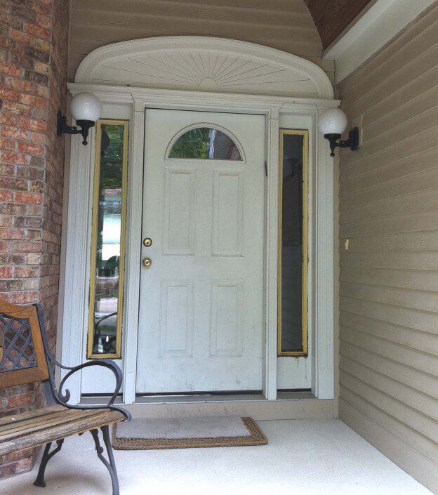 1. Front entrance of a home in Newton, MA in need of remodeling