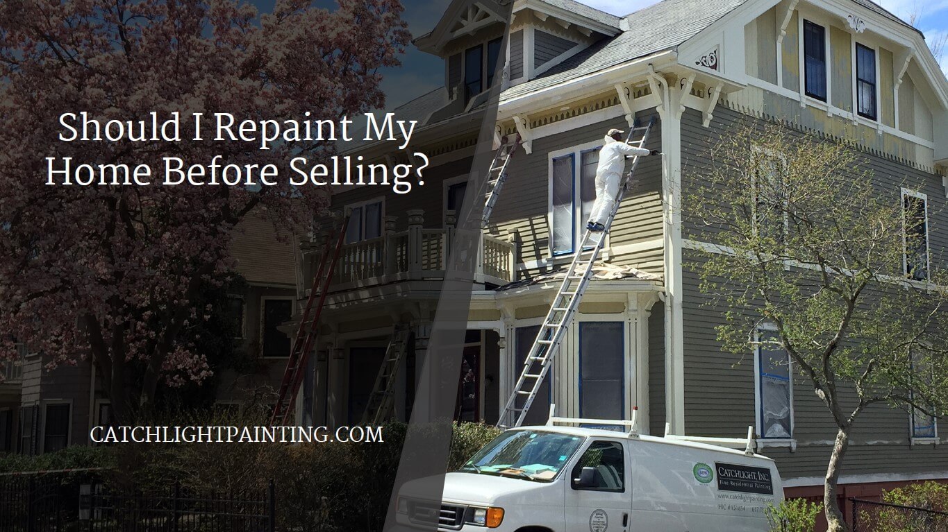 Catchlight employees painting exterior of a home