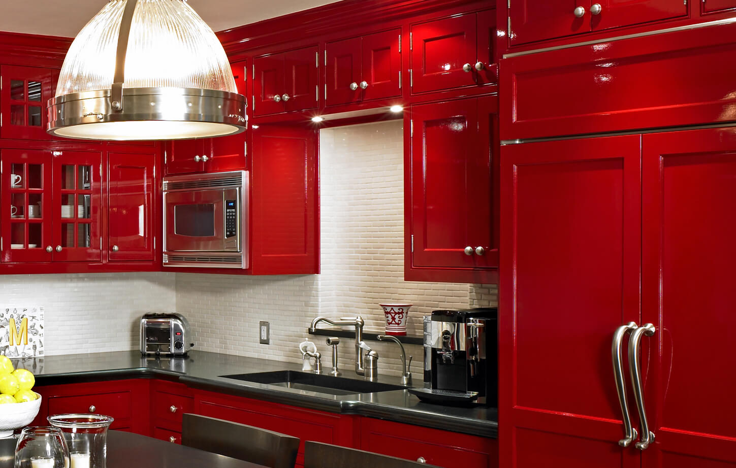 red kitchen cabinet with farmhouse sink