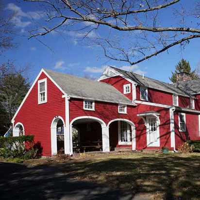 historic red home exterior painted