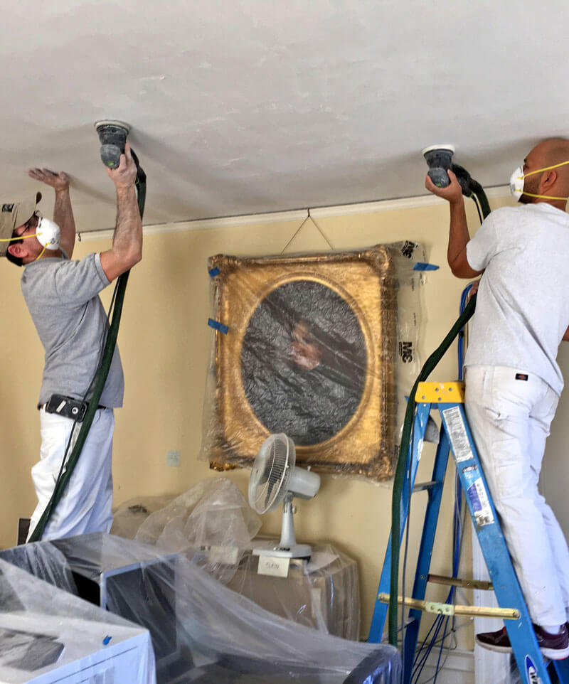 Newton painters working on ceiling