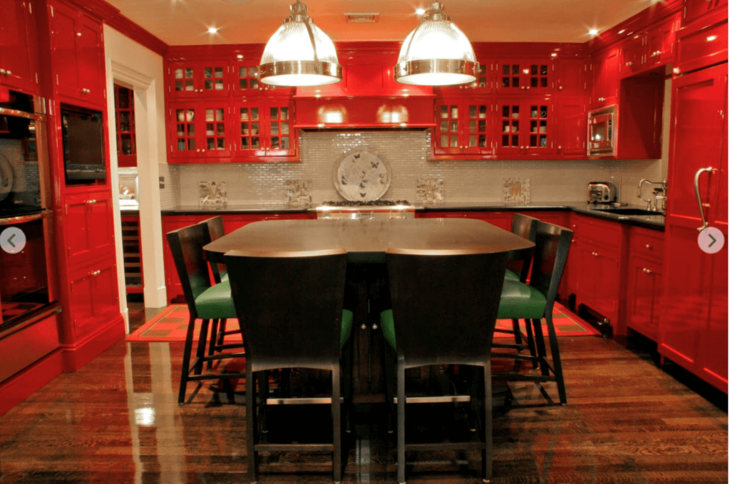 beautiful vibrant red kitchen in a historic New England home